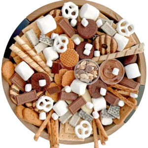 12-inch round s’mores dessert board with marshmallows, graham crackers, pretzel sticks, yogurt-dipped pretzels, brownie bites, chocolate wafers, mini stroopwaffels, Hershey chocolate, peanut chocolate chip trail mix, Nutella, and assorted cookies arranged for a festive charcuterie-style display — Fork and Flare Orange County catering.