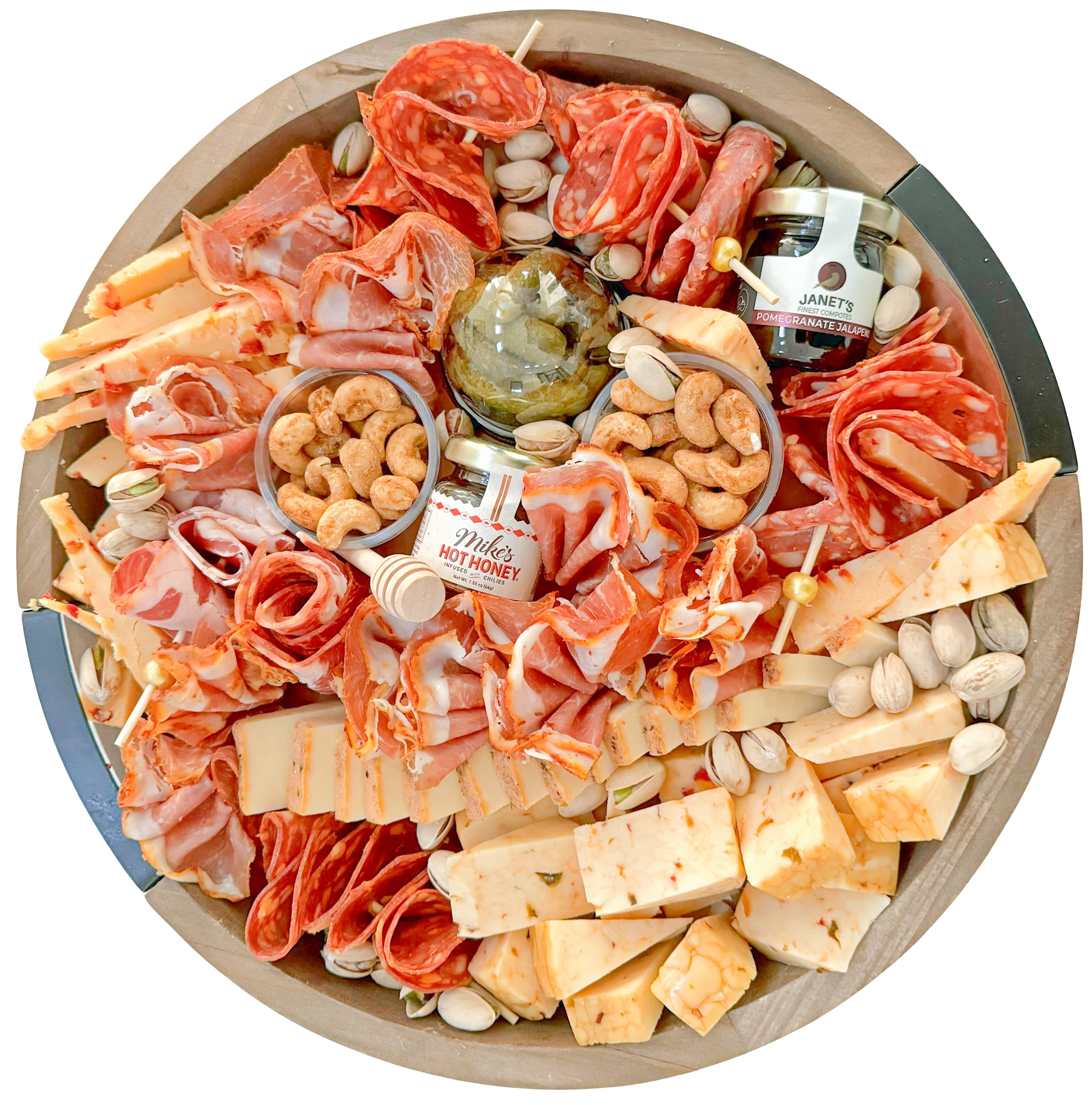 12-inch spicy charcuterie board featuring chili garlic cashews, cajun cheddar, smoked gouda, scotch bonnet cheddar, spicy cornichons, jalapeño jam, hot sopressata salami, spicy prosciutto, uncured hot copa, chorizo with paprika and oregano, chili crackers, pistachios, and Mike’s Hot Honey — Fork and Flare Orange County catering.