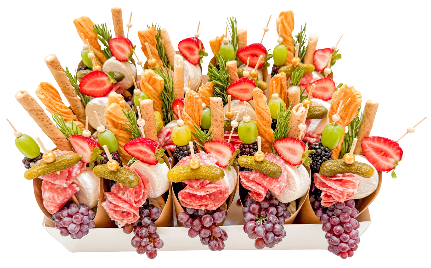 Individual charcuterie cups by Fork and Flare in Orange County, CA filled with brie cheese, strawberries, cornichons, cured meats, mini grapes, pistachios, crackers, blueberries, and blackberries—perfect for open houses, real estate events, and elegant gatherings.