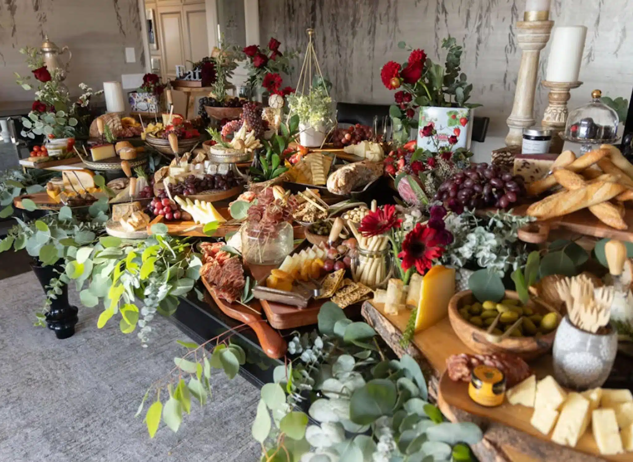 Luxury charcuterie grazing table setup by Fork and Flare in Irvine, CA, showcasing premium cheeses, charcuterie, dips, and breads for a corporate event.