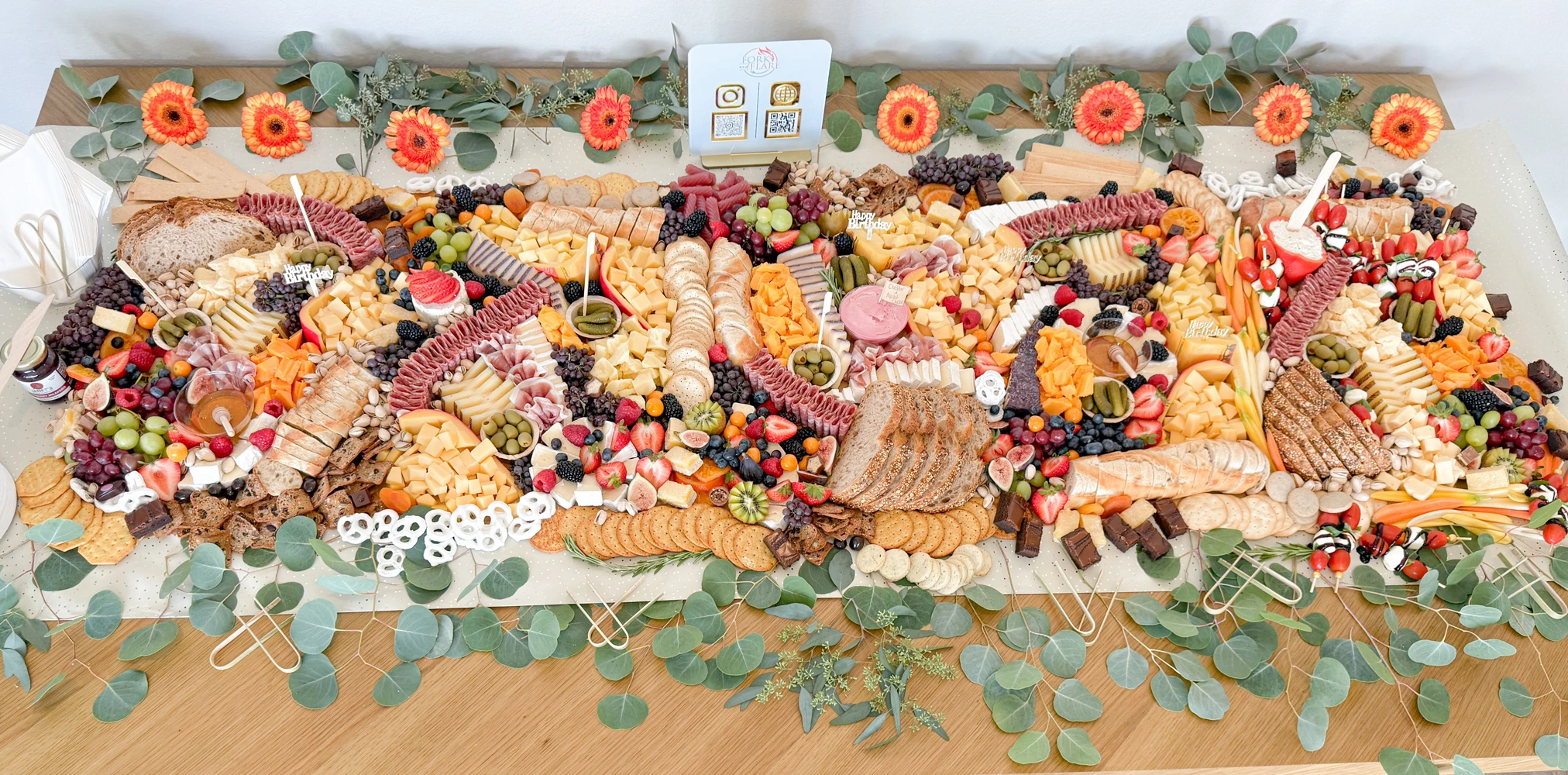 Fork and Flare charcuterie grazing table in Orange County with cheeses, meats, fruits, and crudités for weddings, parties, and events.