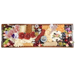 Grab and Graze charcuterie board by Fork and Flare in Irvine, Orange County California serving 36 to 42 guests with over six pounds of fine cheeses, imported hand cut salami, fresh berries and grapes, artisan crackers, mixed nuts, olives, jam, honey and stone ground mustard for luxury event catering and delivery.