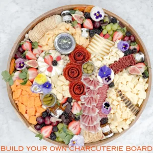 large charcuterie board from Fork and Flare in Orange County designed for corporate events and weddings with hand selected cheeses, cured meats, fresh fruit, honey, and spreads for pickup or local delivery.